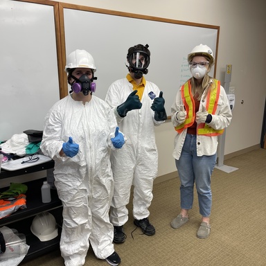 Students with task-specific PPE donned in class
